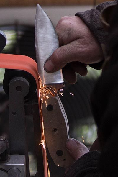 an image of a beginner making a knife. What is the best steel for beginners?