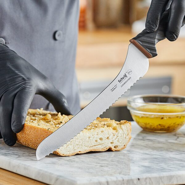 An image of a serrated knife. What is a serrated knife good for?